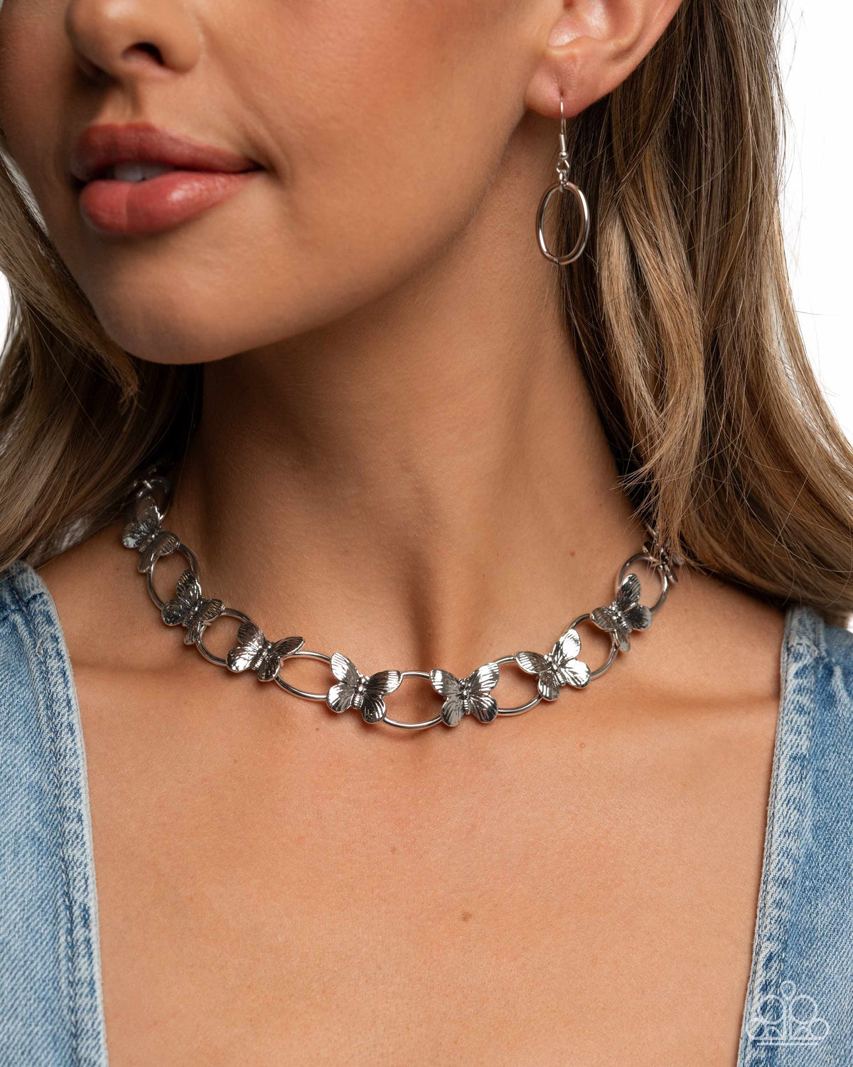 Butterfly Build Silver Butterfly Choker Necklace & Bracelet Set - Paparazzi Accessories- necklace on model - CarasShop.com - Paparazzi Jewelry by Cara Jewels