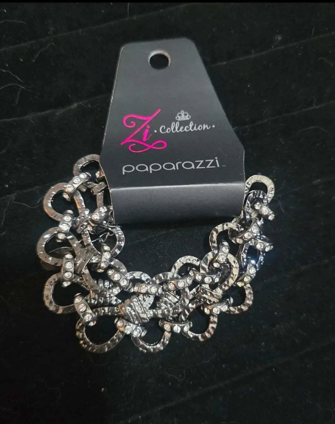 Cherish The Moment Gunmetal Black & White Rhinestone Zi Collection Bracelet - Paparazzi Accessories stylized on model wearing black - CarasShop.com - Paparazzi Jewelry by Cara Jewels