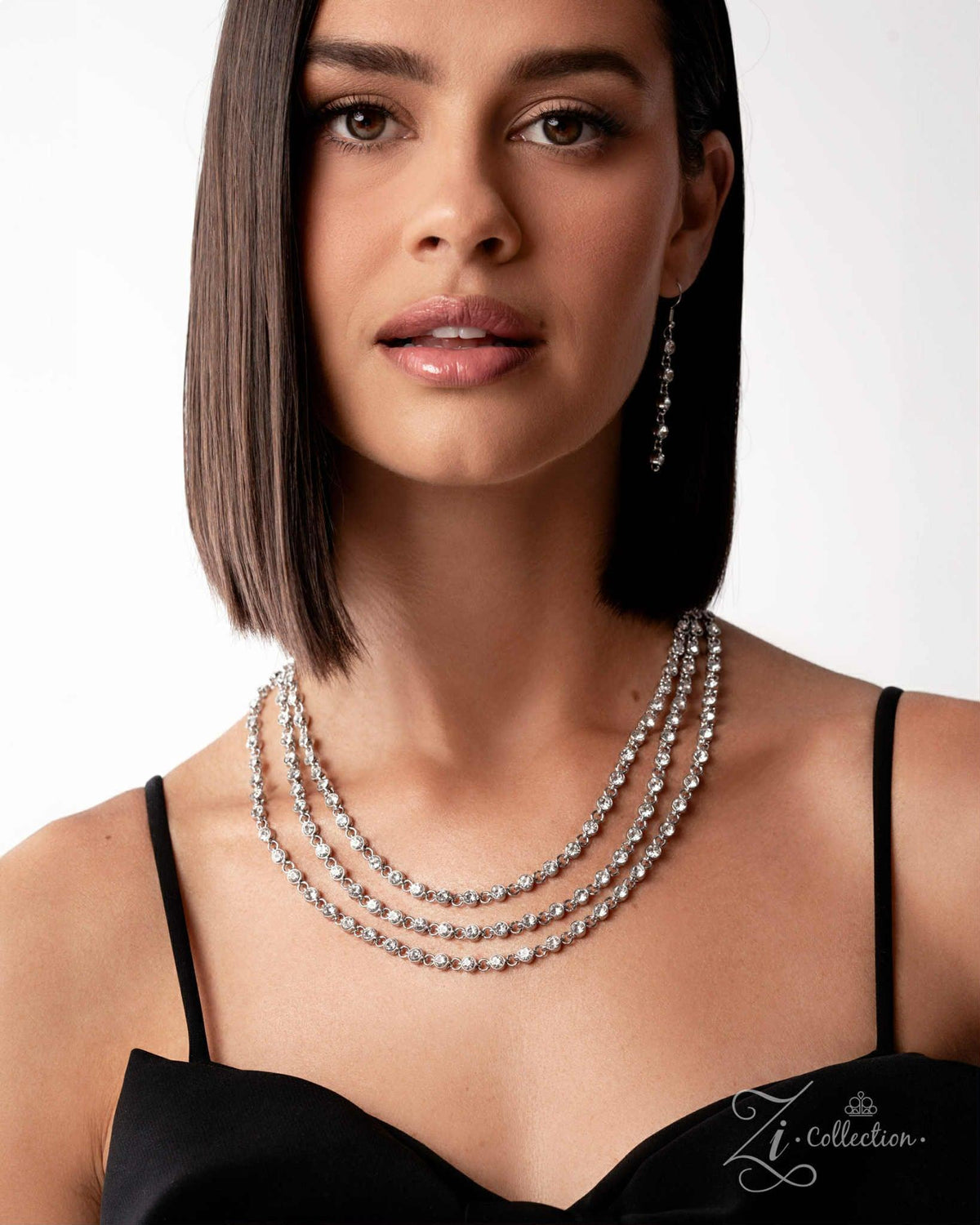 Demure 2025 Zi Collection Necklace - Paparazzi Accessories stylized on model wearing black - CarasShop.com - Paparazzi Jewelry by Cara Jewels