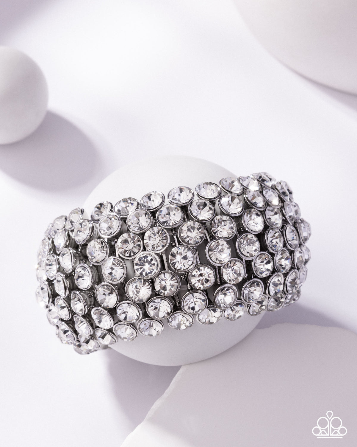 Paparazzi Playing With Fire White Rhinestone Zi Collection Bracelet stylized on model wearing black - CarasShop.com - Paparazzi Jewelry by Cara Jewels