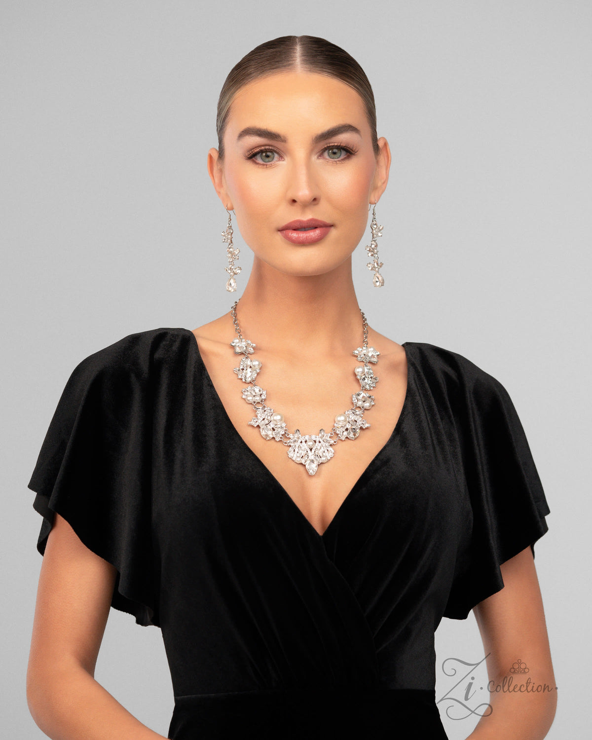 The Aleshia 2024 Zi Signature Collection Necklace - Paparazzi Accessories stylized on model wearing black - CarasShop.com - Paparazzi Jewelry by Cara Jewels