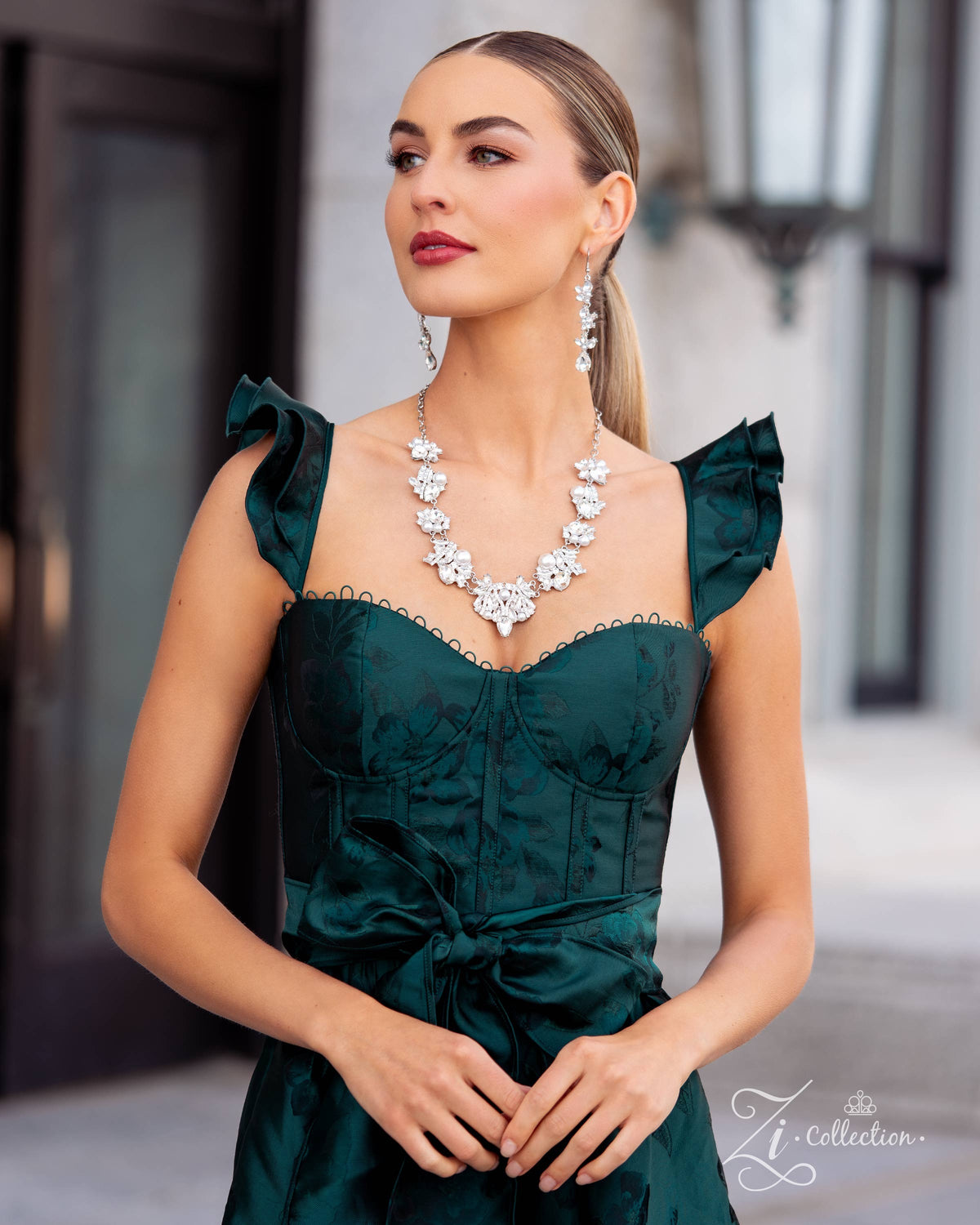 The Aleshia 2024 Zi Signature Collection Necklace - Paparazzi Accessories stylized on model in casual dress - CarasShop.com - Paparazzi Jewelry by Cara Jewels