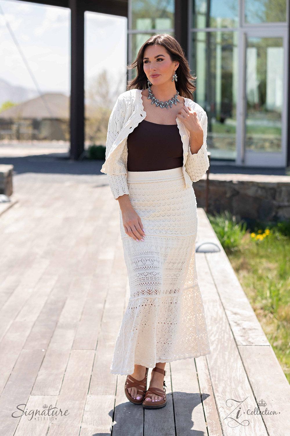 The April 2023 Zi Signature Collection Necklace - Paparazzi Accessories stylized on model in casual dress - CarasShop.com - Paparazzi Jewelry by Cara Jewels