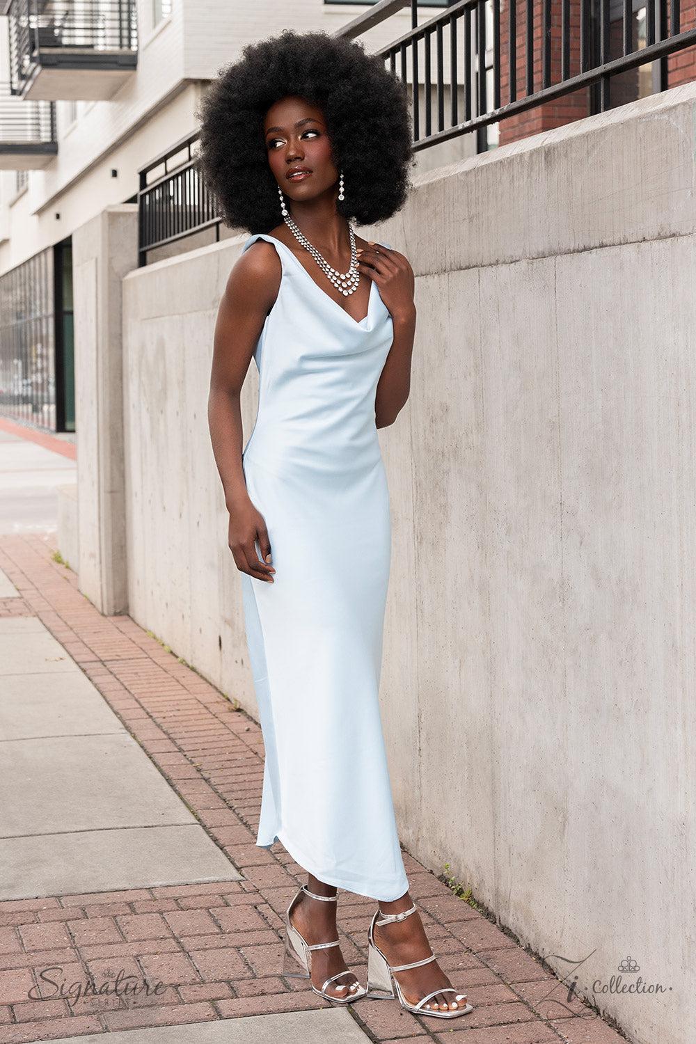 The Dana 2023 Zi Signature Collection Necklace - Paparazzi Accessories stylized on model in casual dress - CarasShop.com - Paparazzi Jewelry by Cara Jewels