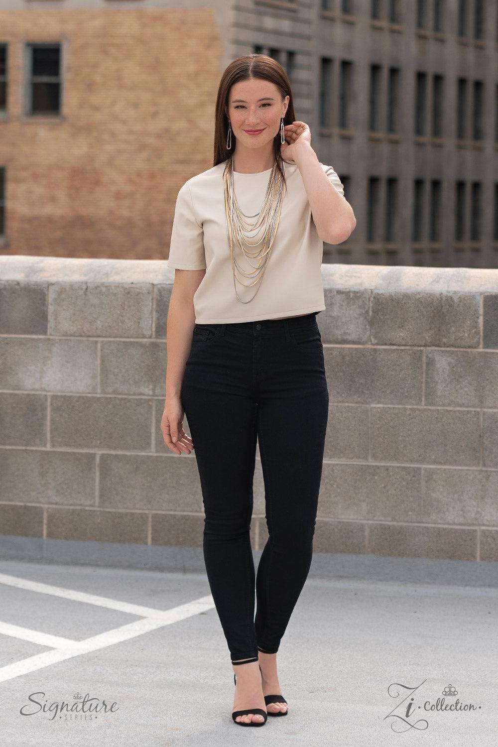 The Linda 2023 Zi Signature Collection Necklace - Paparazzi Accessories stylized on model in casual dress - CarasShop.com - Paparazzi Jewelry by Cara Jewels