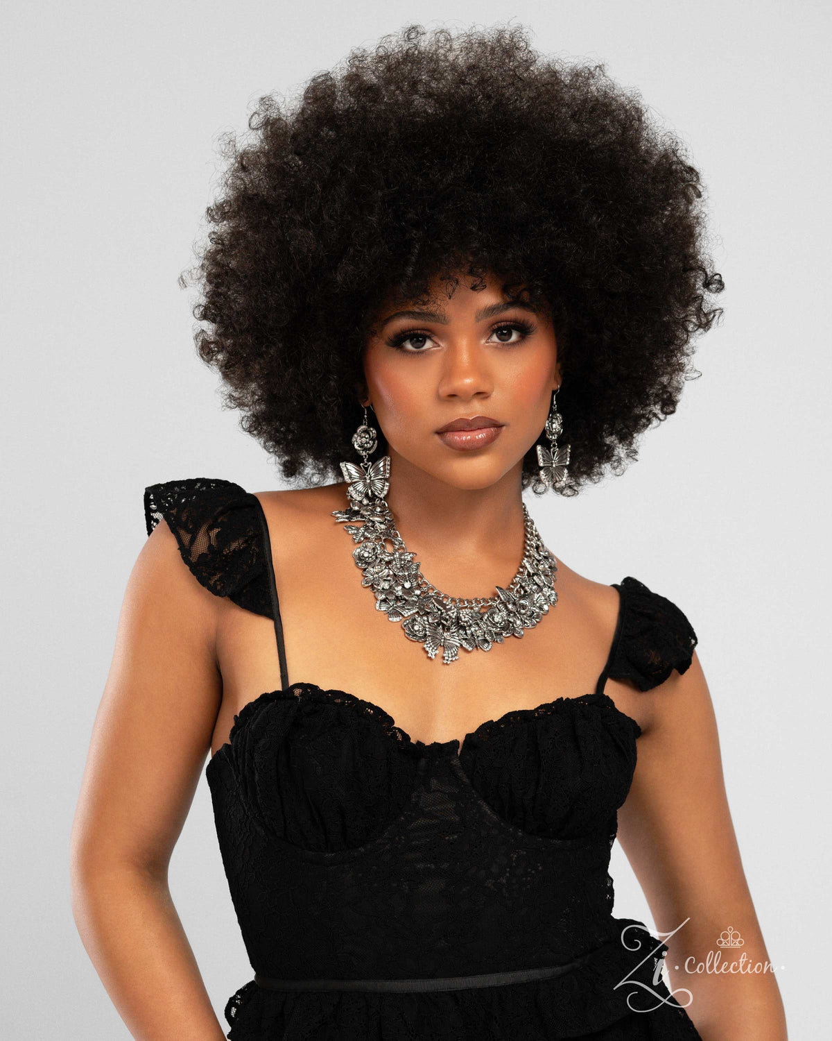 The McKayla 2024 Zi Signature Collection Necklace - Paparazzi Accessories stylized on model wearing black - CarasShop.com - Paparazzi Jewelry by Cara Jewels