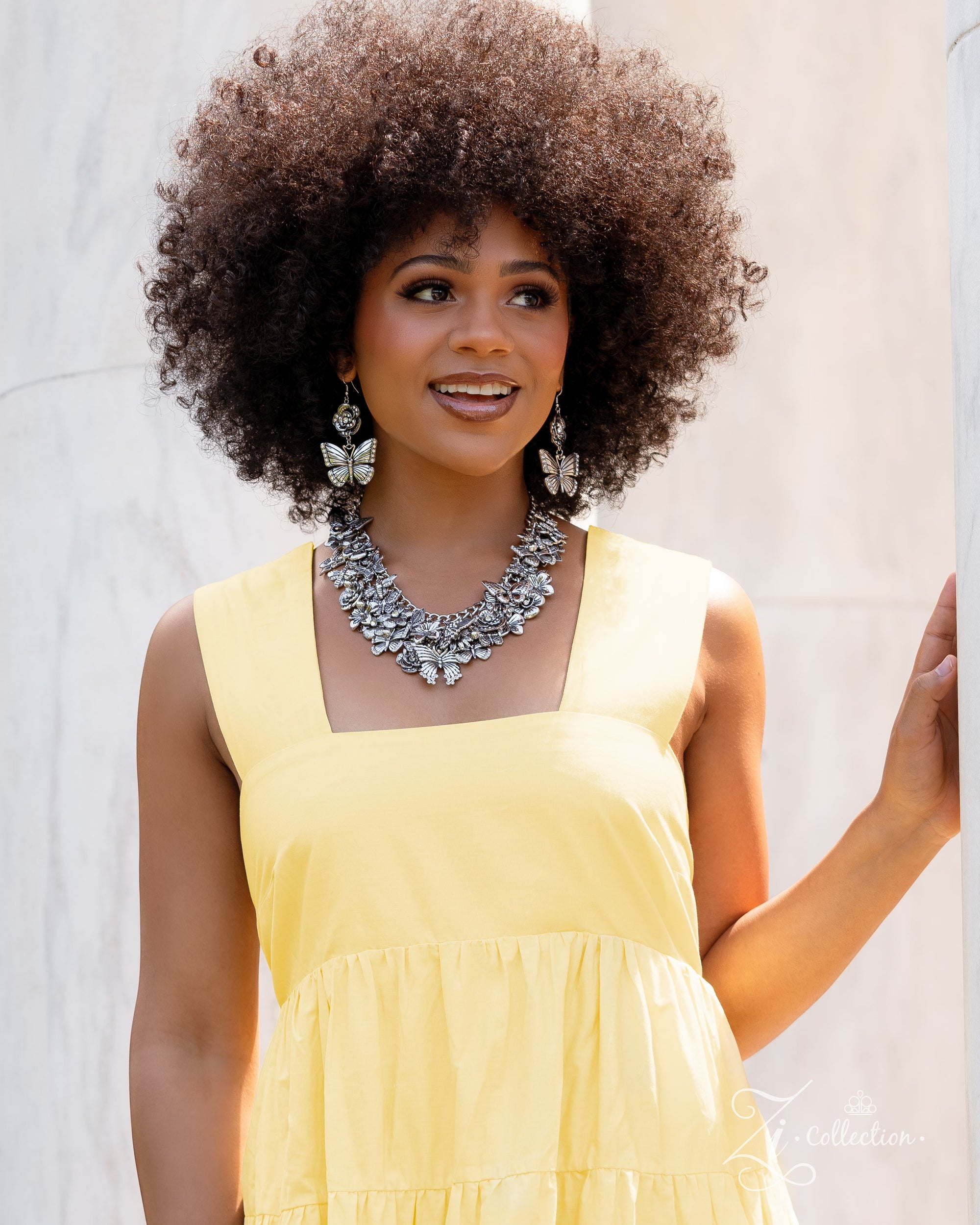 The McKayla 2024 Zi Signature Collection Necklace - Paparazzi Accessories stylized on model in casual dress - CarasShop.com - Paparazzi Jewelry by Cara Jewels