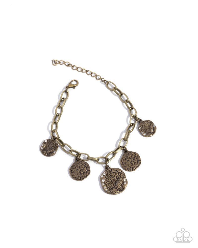 Winking Wild Brass Bracelet - Paparazzi Accessories