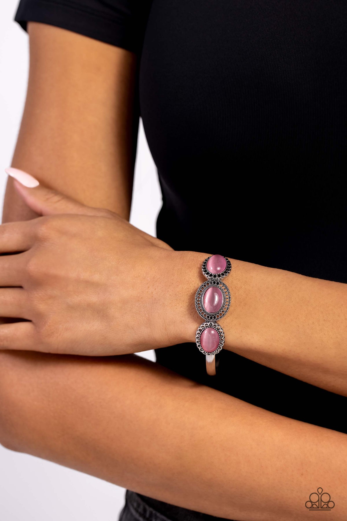 A DAYDREAM Come True Pink Cat's Eye Stone Bangle Bracelet - Paparazzi Accessories- on model - CarasShop.com - Paparazzi Jewelry by Cara Jewels