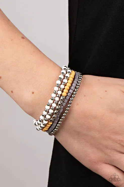 Adventure Is Calling Silver Bracelet - Paparazzi Accessories- on model - CarasShop.com - Paparazzi Jewelry by Cara Jewels