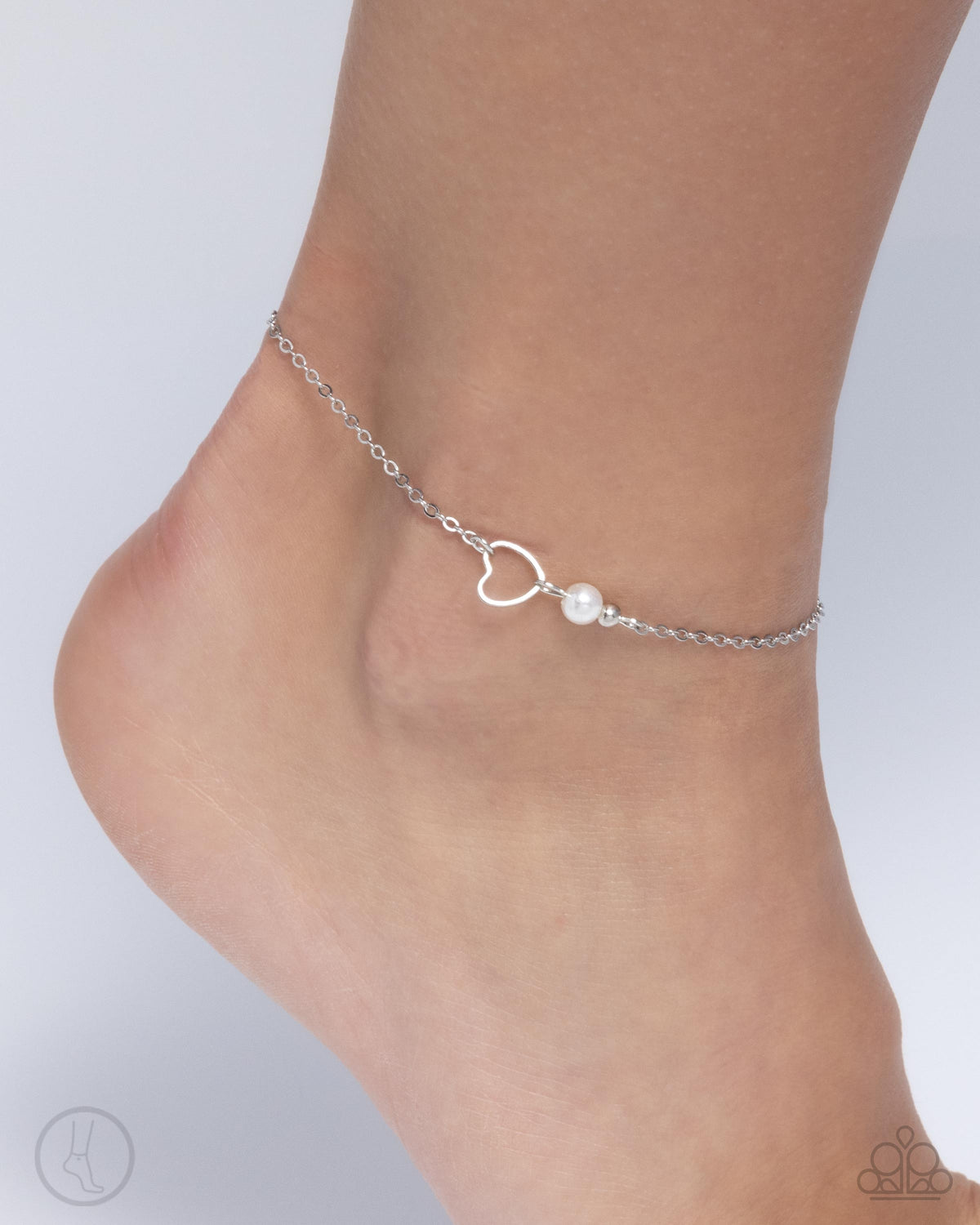 Affectionate Assertion White Pearl & Heart Anklet - Paparazzi Accessories- on model - CarasShop.com - Paparazzi Jewelry by Cara Jewels