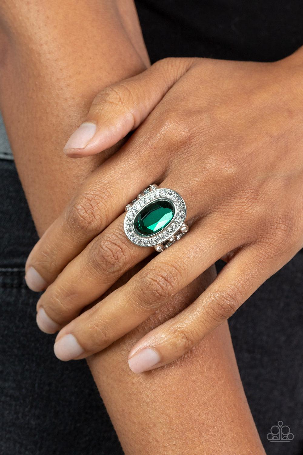 Always OVAL-achieving Green Rhinestone Ring - Paparazzi Accessories- on model - CarasShop.com - Paparazzi Jewelry by Cara Jewels