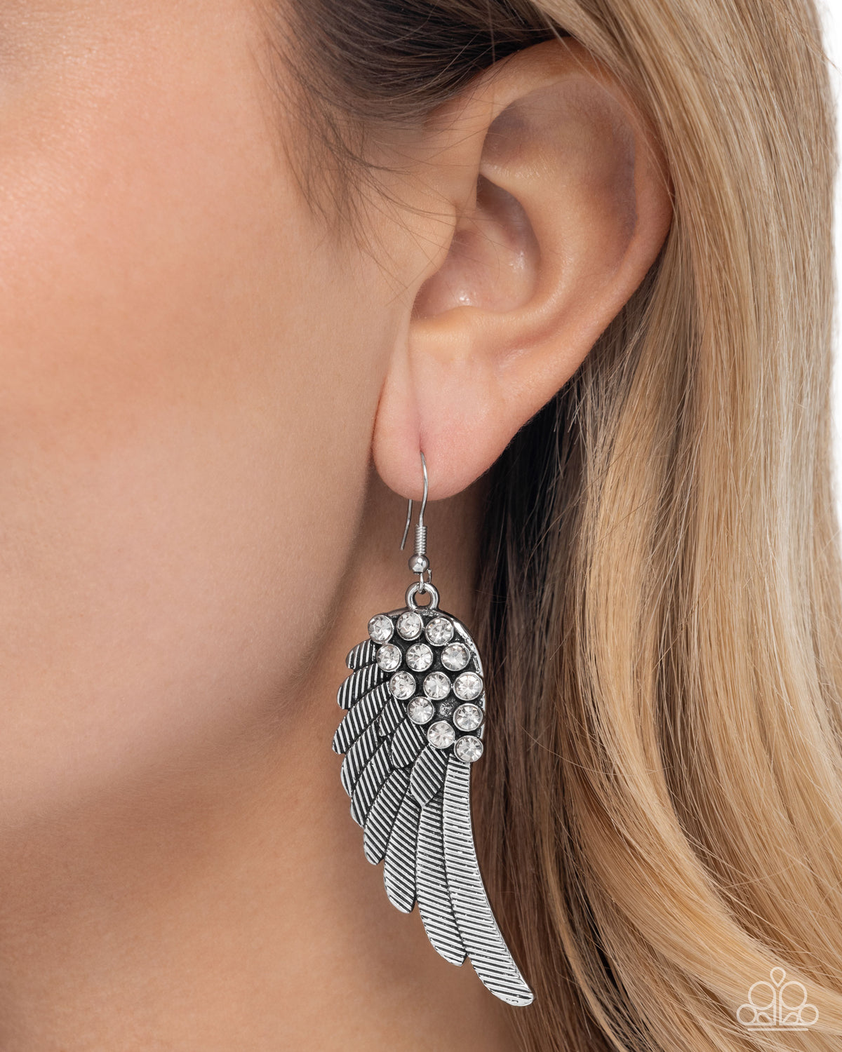 Angelic Abundance Silver Wing Earrings - Paparazzi Accessories- on model - CarasShop.com - Paparazzi Jewelry by Cara Jewels