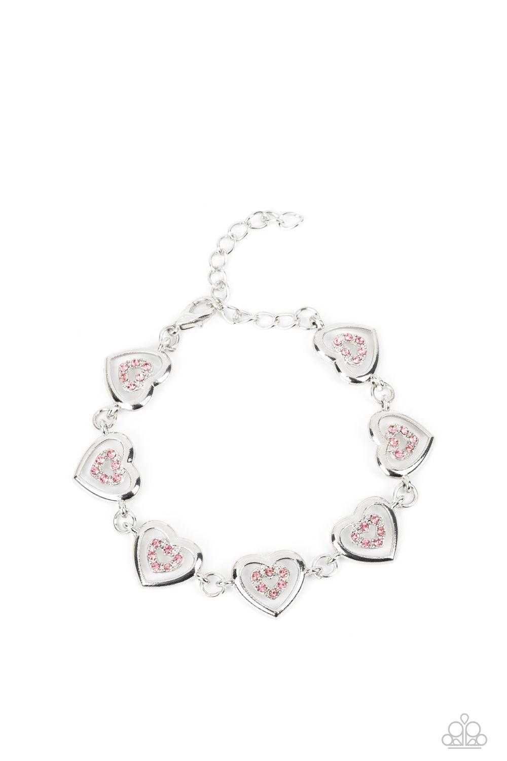 Catching Feelings Pink Rhinestone Heart Bracelet - Paparazzi Accessories- lightbox - CarasShop.com - Paparazzi Jewelry by Cara Jewels
