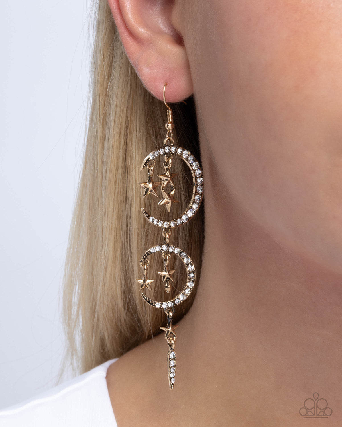 Celestial Cascade Gold & White Rhinestone Moon & Star Earrings - Paparazzi Accessories- on model - CarasShop.com - Paparazzi Jewelry by Cara Jewels