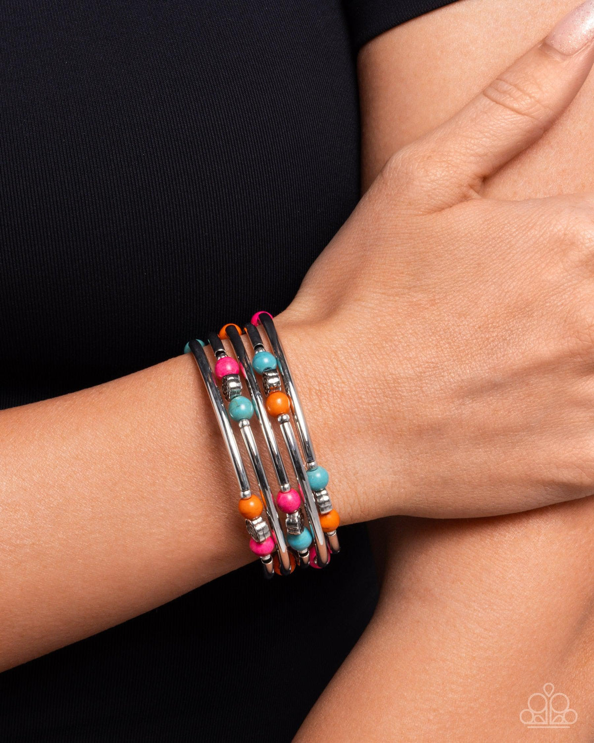 Classic Cowboy Pink & Multi Stone Coil Bracelet - Paparazzi Accessories- on model - CarasShop.com - Paparazzi Jewelry by Cara Jewels