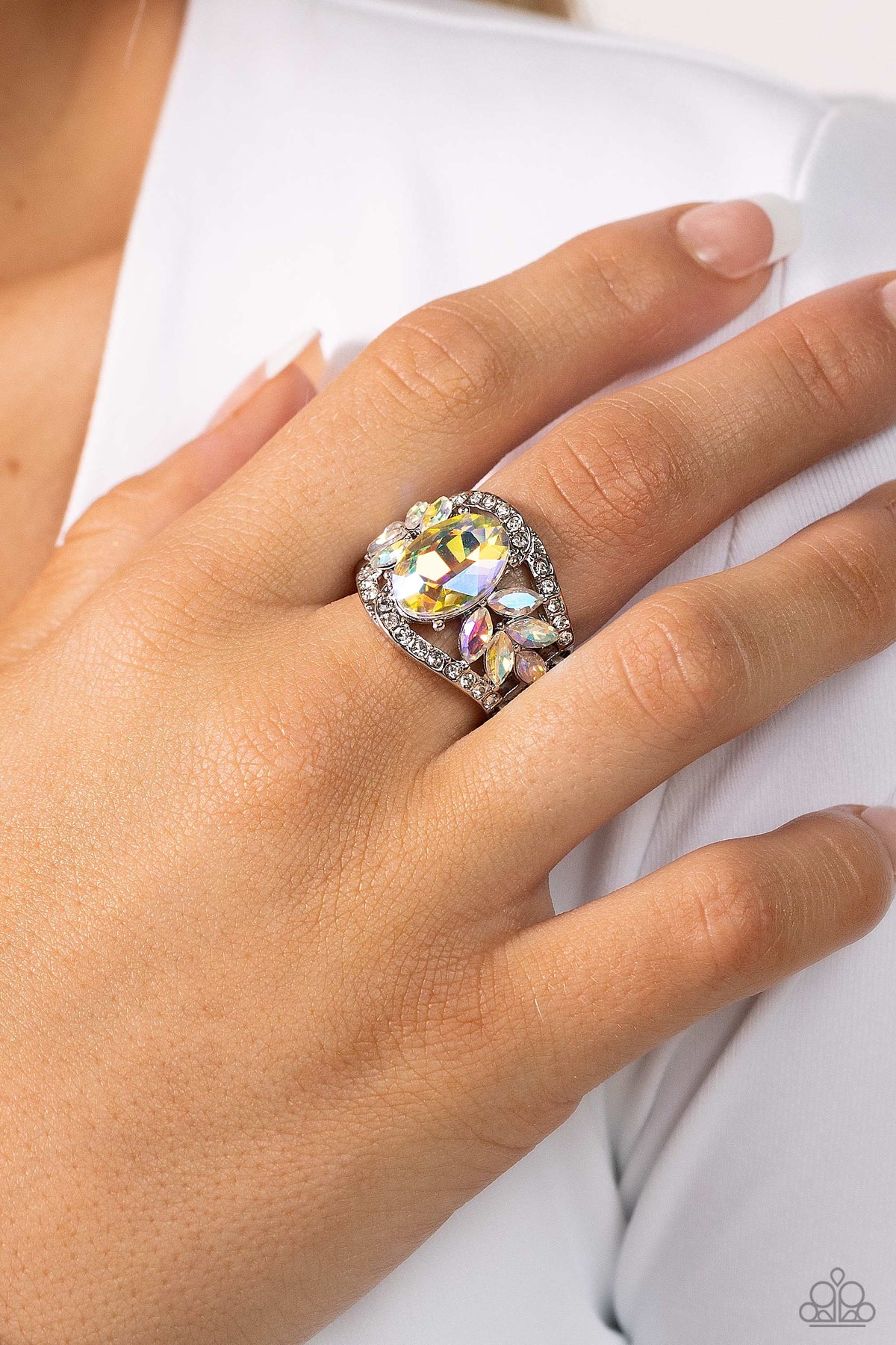 Cosmic Clique Multi Iridescent Rhinestone Ring - Paparazzi Accessories- on model - CarasShop.com - Paparazzi Jewelry by Cara Jewels