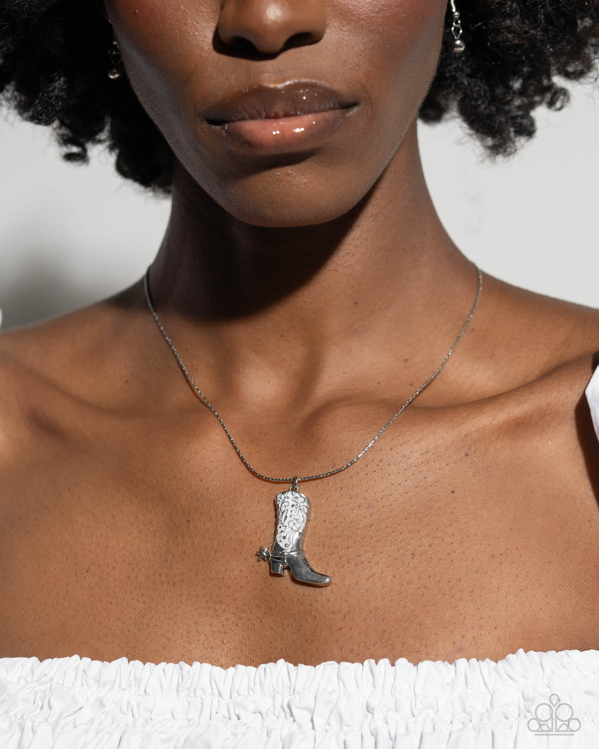 Cowboy Confidence White Boot Charm Necklace - Paparazzi Accessories- on model - CarasShop.com - Paparazzi Jewelry by Cara Jewels