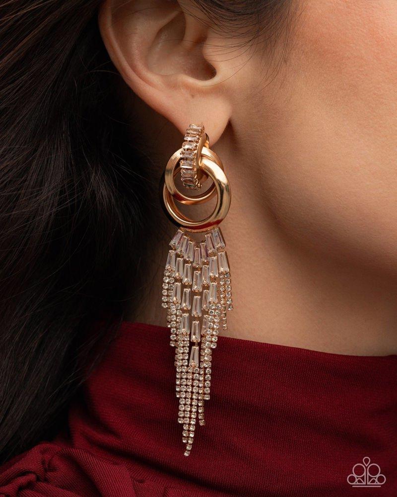 Draped in Drama Gold & White Rhinestone Earrings - Paparazzi Accessories-on model - CarasShop.com - Paparazzi Jewelry by Cara Jewels