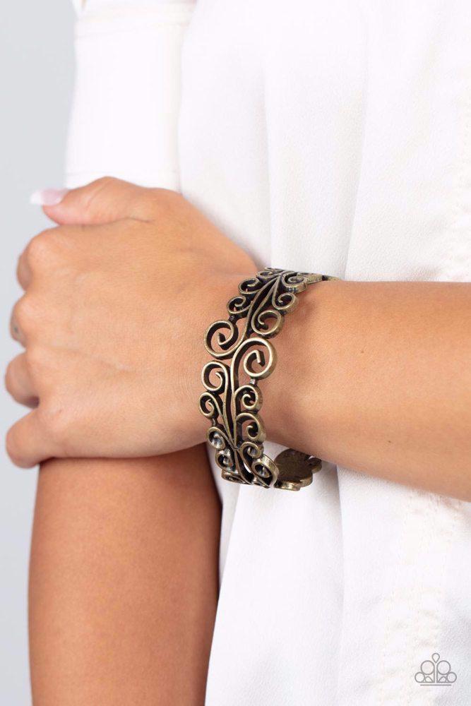Dressed to FRILL Brass Bracelet - Paparazzi Accessories- on model - CarasShop.com - Paparazzi Jewelry by Cara Jewels