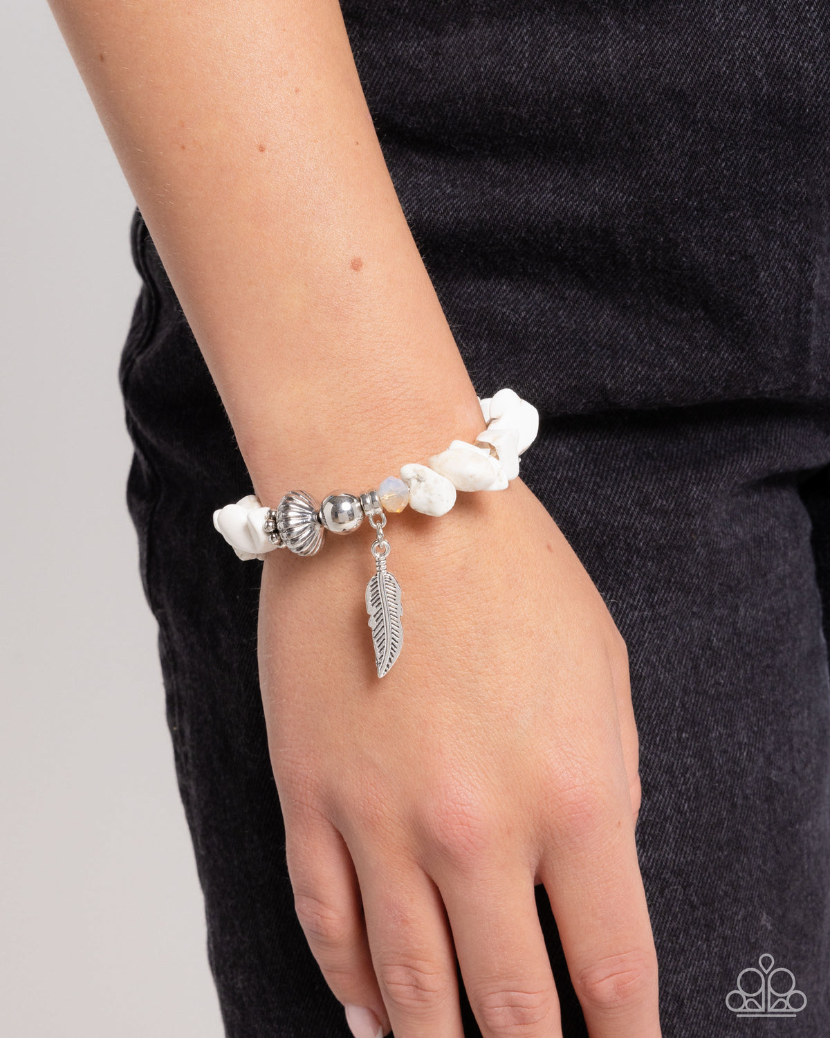 Earthy Earning White Stone & Silver Feather Bracelet - Paparazzi Accessories- on model - CarasShop.com - Paparazzi Jewelry by Cara Jewels