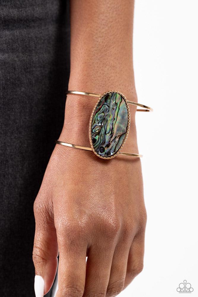 Enigmatic Energy Gold Bracelet - Paparazzi Accessories- on model - CarasShop.com - Paparazzi Jewelry by Cara Jewels