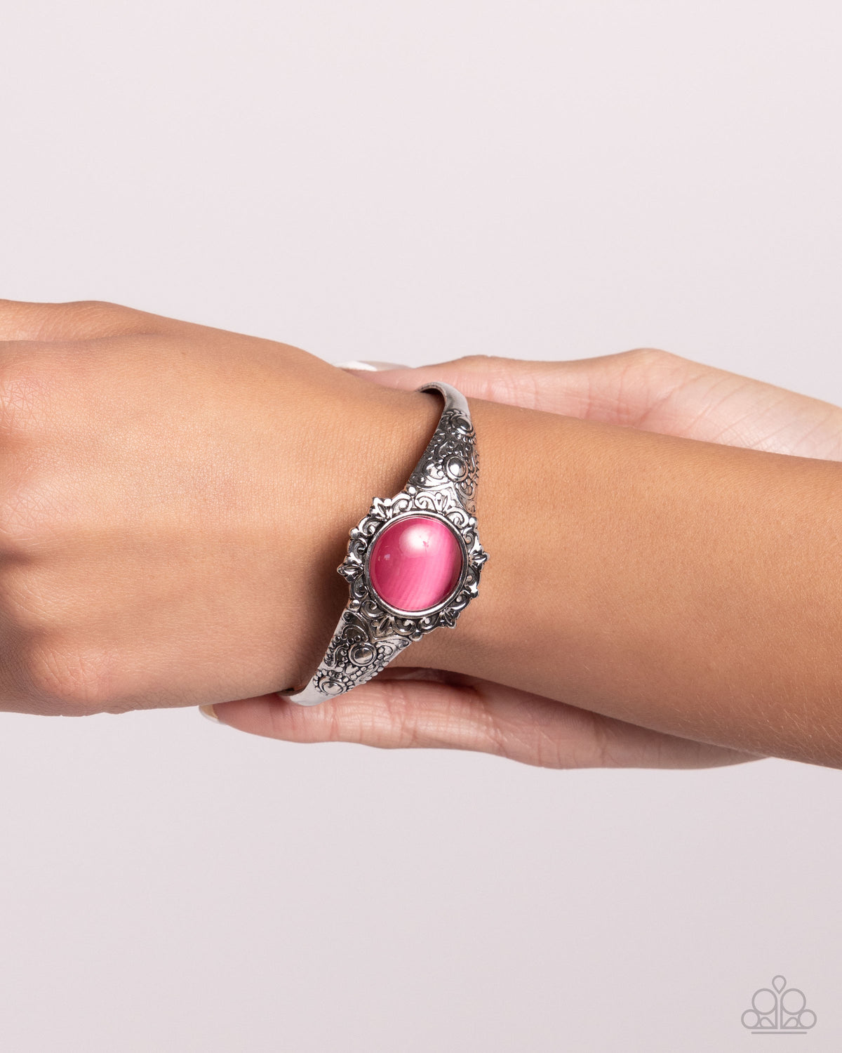 Extravagantly Enchanting Pink Cat's Eye Stone Cuff Bracelet - Paparazzi Accessories- on model - CarasShop.com - Paparazzi Jewelry by Cara Jewels