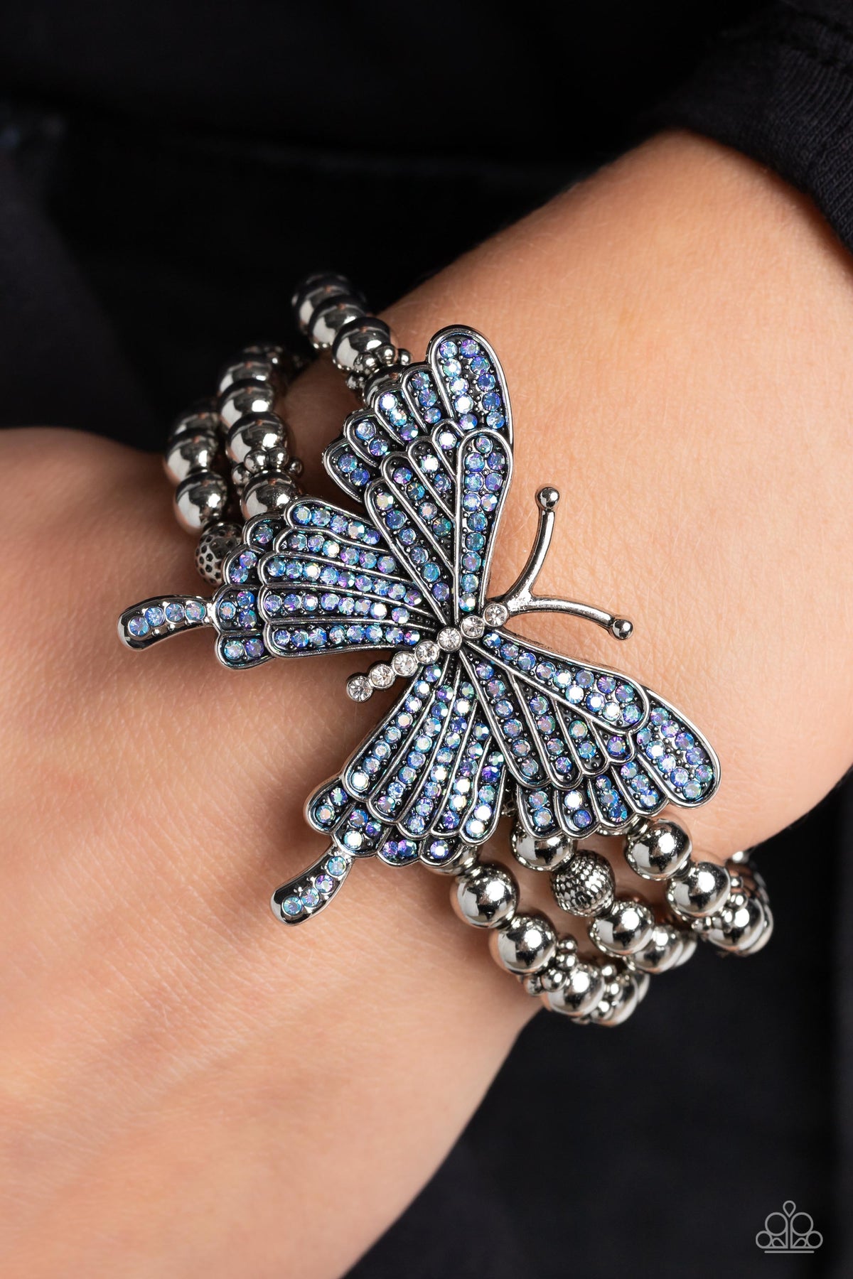 First WINGS First Blue Butterfly Bracelet - Paparazzi Accessories- on model - CarasShop.com - Paparazzi Jewelry by Cara Jewels
