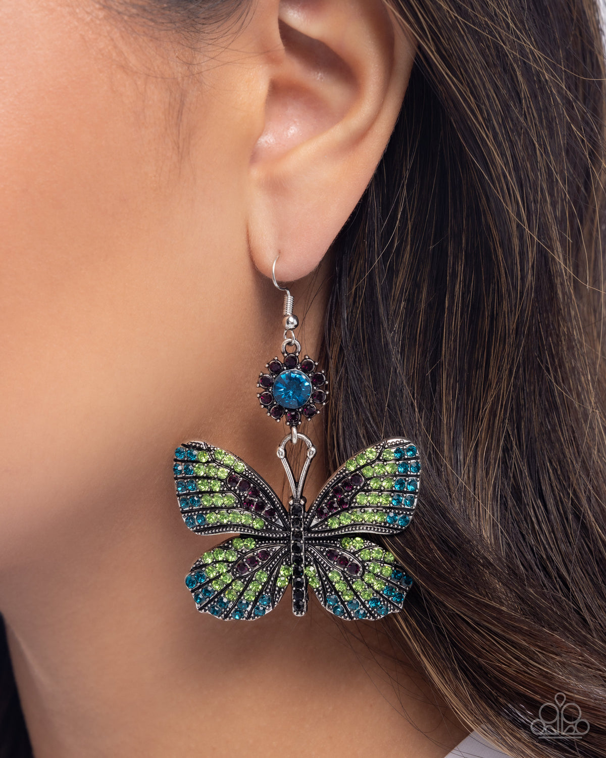 Fluttering Feature Green & Blue Rhinestone Butterfly Earrings - Paparazzi Accessories- on model - CarasShop.com - Paparazzi Jewelry by Cara Jewels