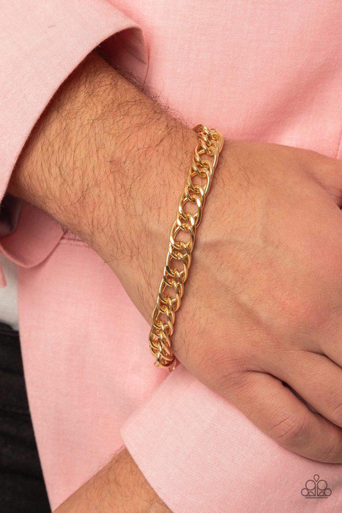 Game-Changing Couture Gold Bracelet - Paparazzi Accessories- on model - CarasShop.com - Paparazzi Jewelry by Cara Jewels