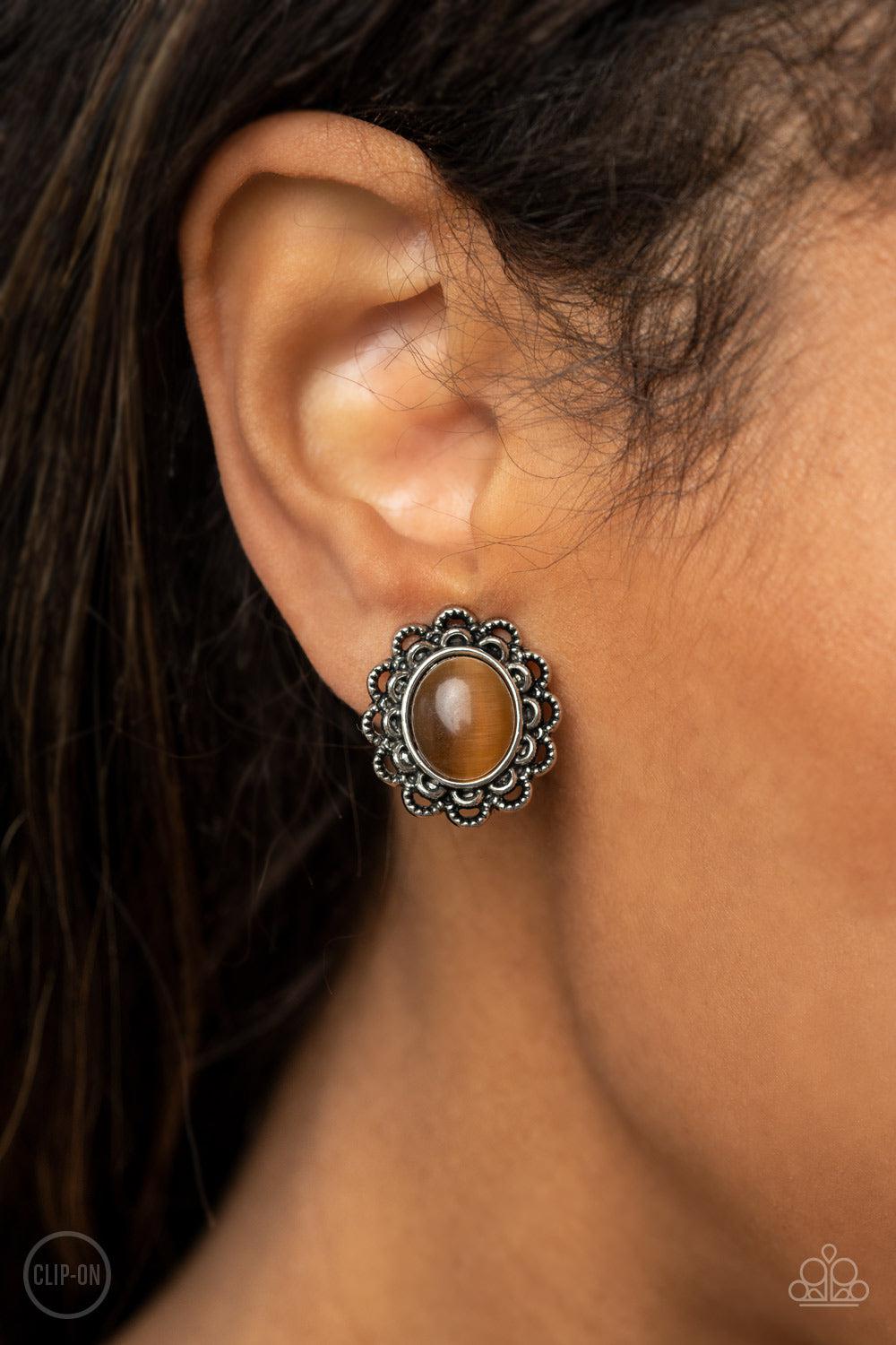Garden Gazebo Brown Cat's Eye Stone Clip-on Earrings - Paparazzi Accessories- on model - CarasShop.com - Paparazzi Jewelry by Cara Jewels