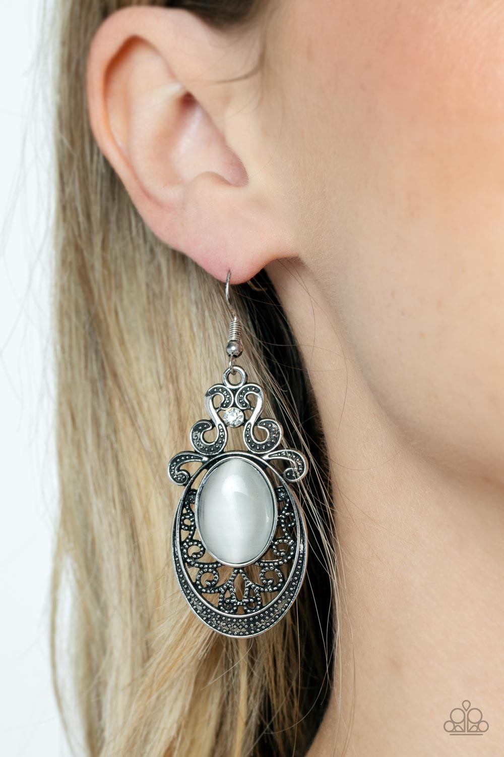Garden Gondola Ride White Cat's Eye Stone Earrings - Paparazzi Accessories- on model - CarasShop.com - Paparazzi Jewelry by Cara Jewels