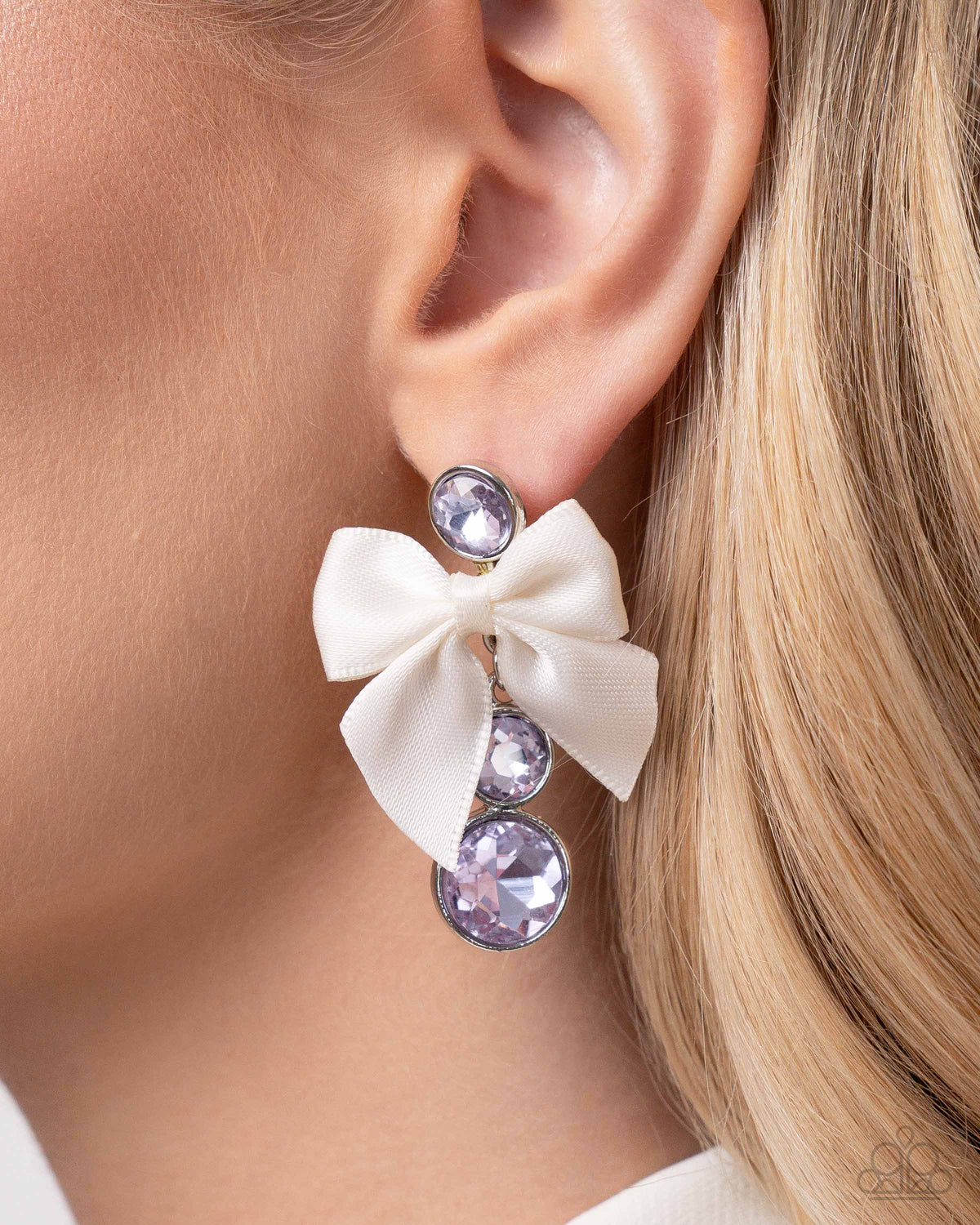 Genteel Glam Purple Rhinestone and Bow Earrings - Paparazzi Accessories- on model - CarasShop.com - Paparazzi Jewelry by Cara Jewels