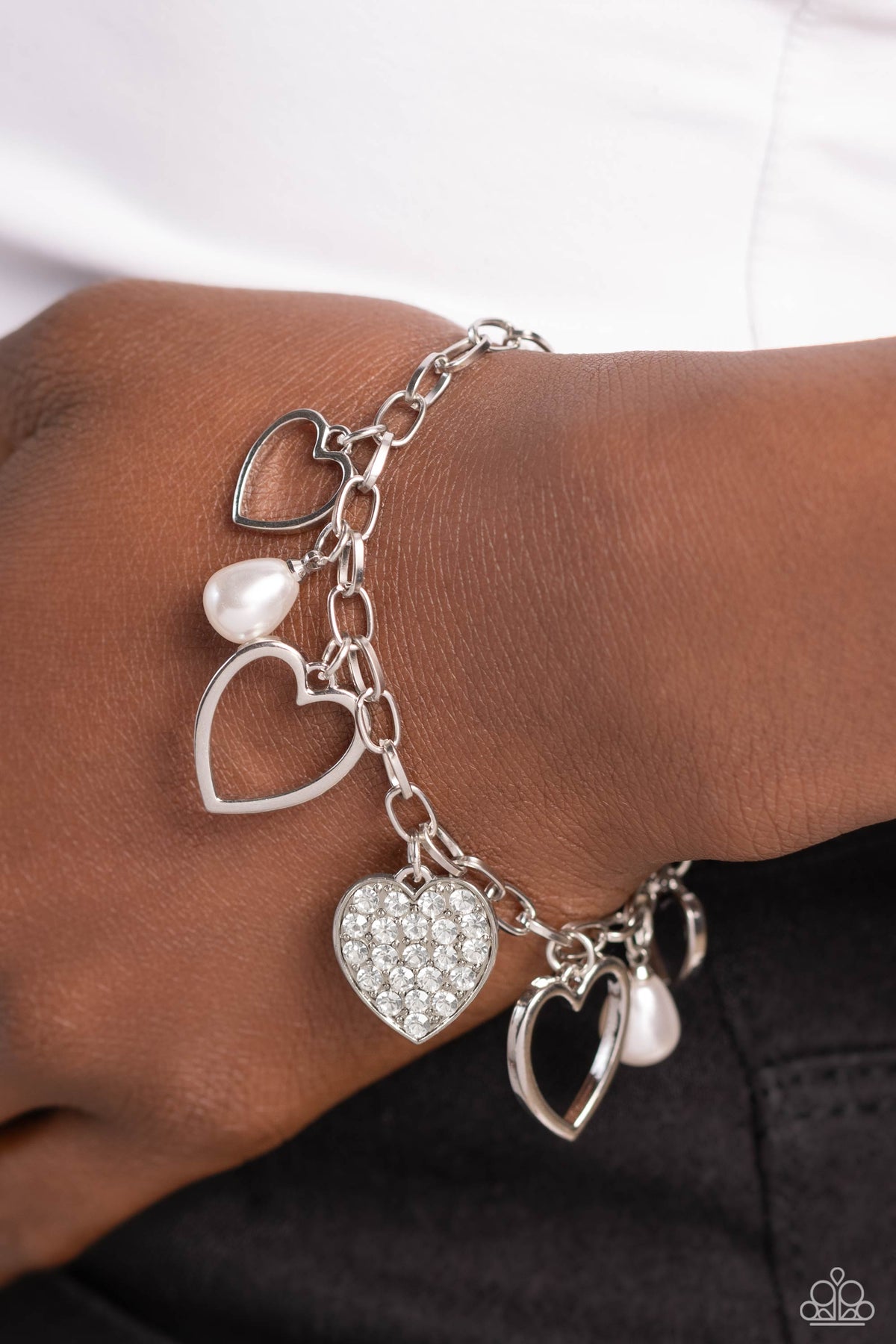 GLOW Your Heart White Bracelet - Paparazzi Accessories- on model - CarasShop.com - Paparazzi Jewelry by Cara Jewels