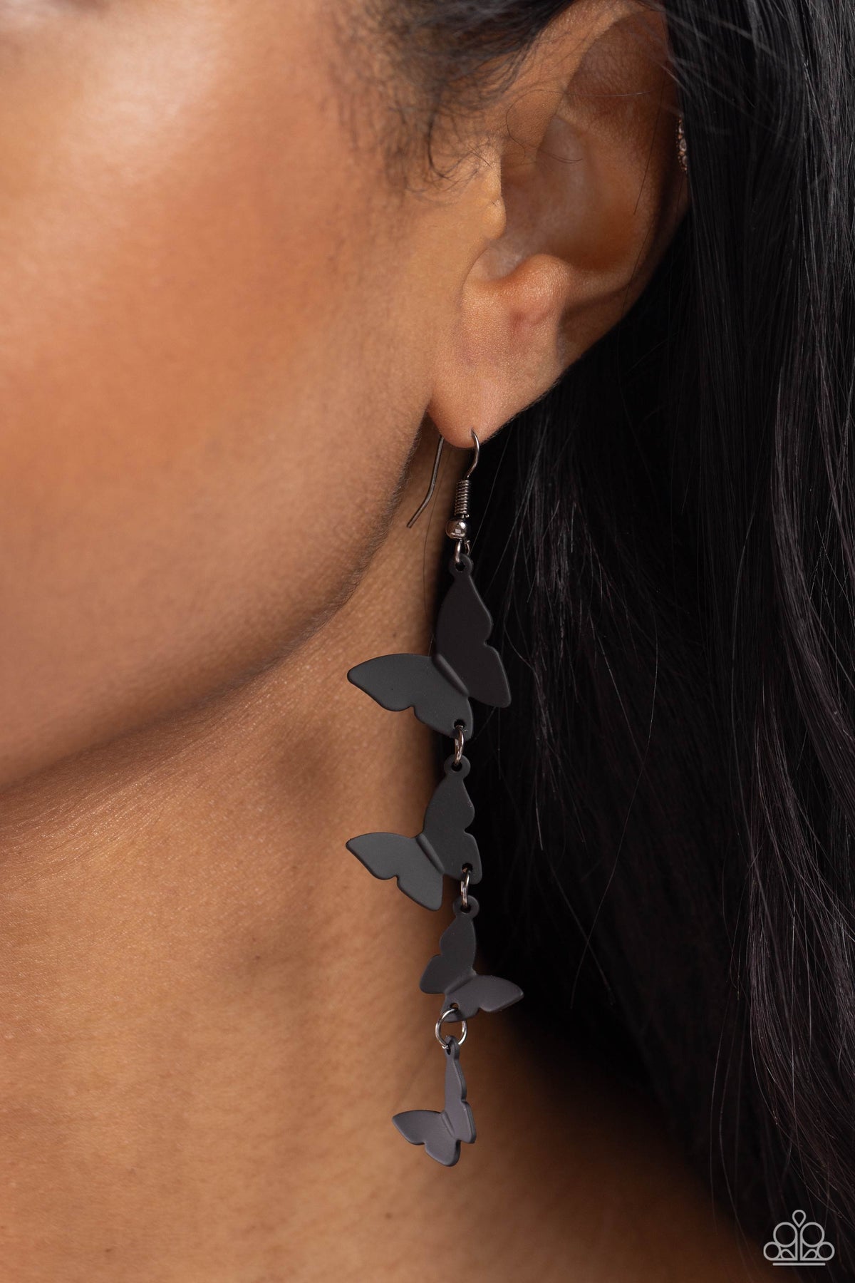Haphazard Headliner Black Butterfly Earrings - Paparazzi Accessories- on model - CarasShop.com - Paparazzi Jewelry by Cara Jewels