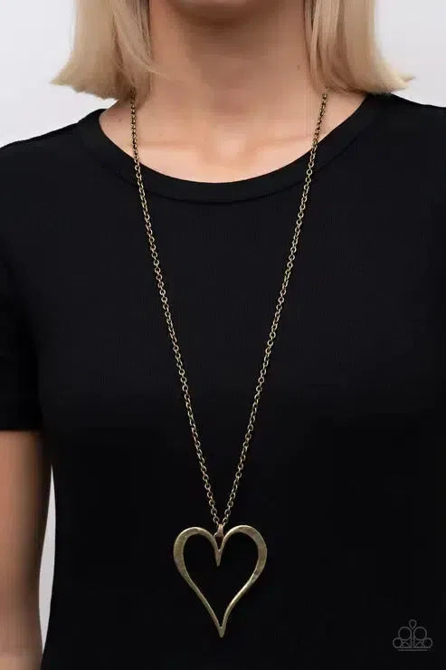 Hopelessly In Love Brass Necklace - Paparazzi Accessories-on model - CarasShop.com - Paparazzi Jewelry by Cara Jewels