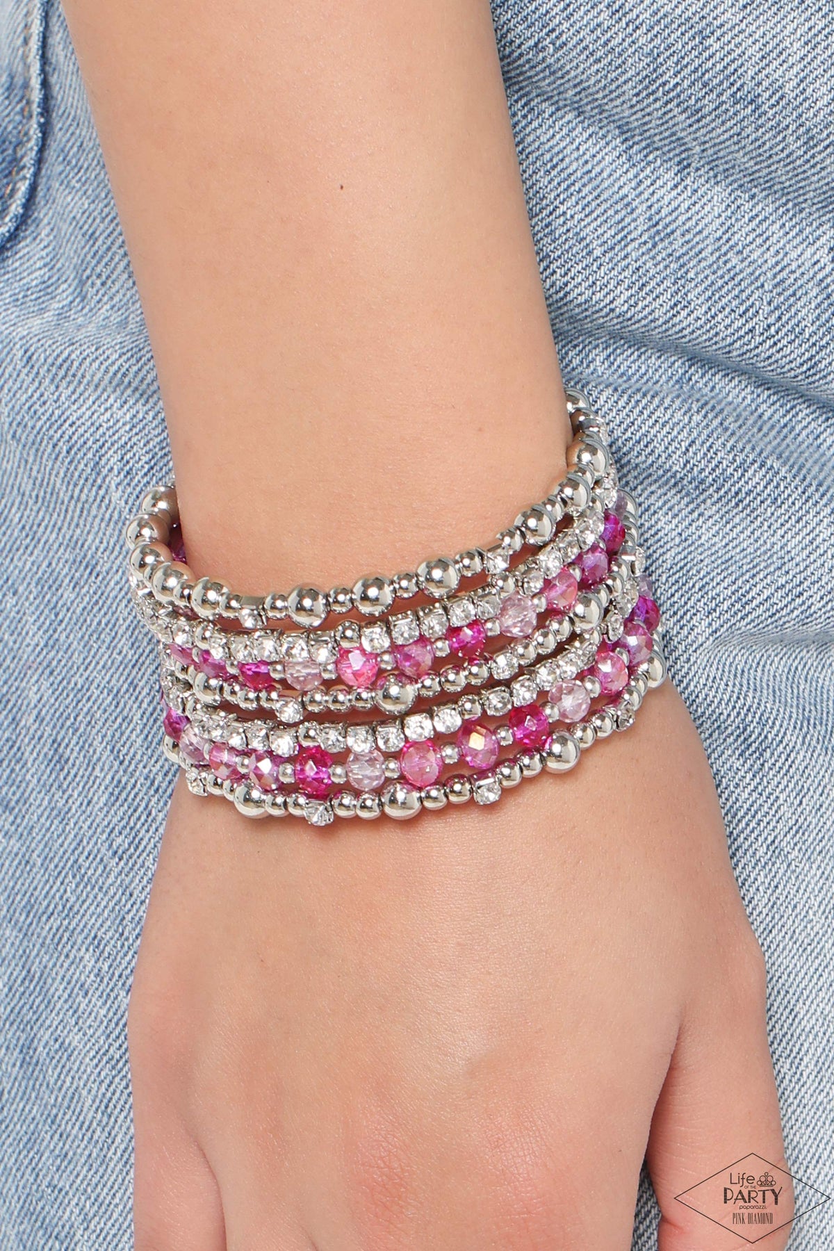 ICE Knowing You Pink Infinity Wrap Bracelet - Paparazzi Accessories- on model - CarasShop.com - Paparazzi Jewelry by Cara Jewels