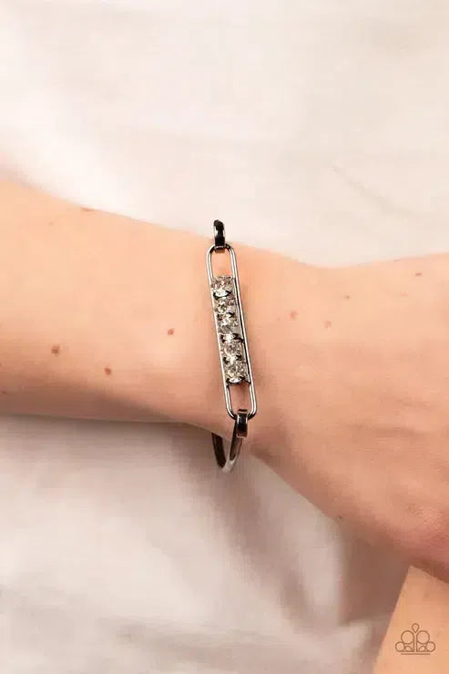 In CHARM'S Way Black Bracelet - Paparazzi Accessories- on model - CarasShop.com - Paparazzi Jewelry by Cara Jewels