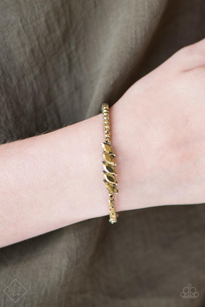 Lap of Luxury Brass Bracelet - Paparazzi Accessories- on model - CarasShop.com - Paparazzi Jewelry by Cara Jewels