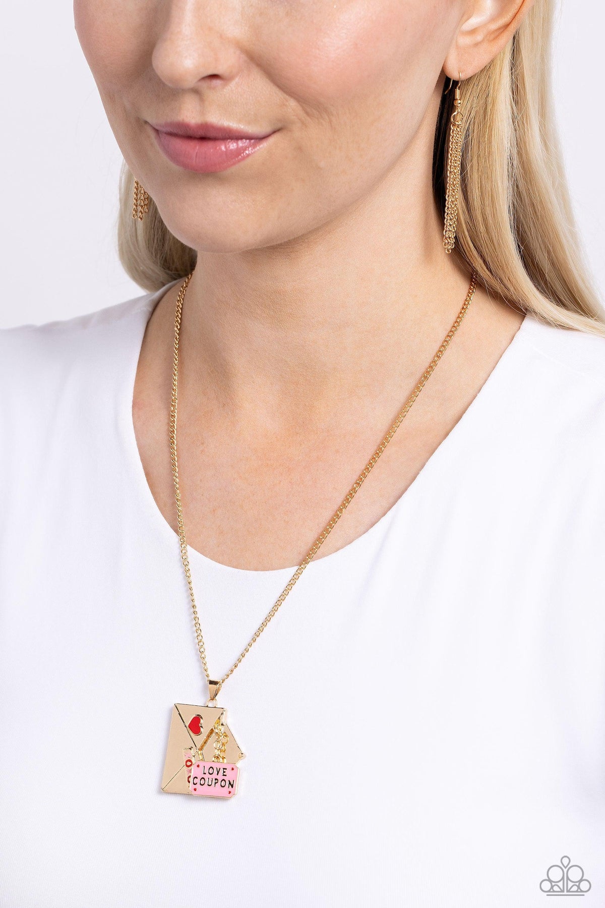 Love Coupon Gold Valentine Charm Necklace - Paparazzi Accessories- on model - CarasShop.com - Paparazzi Jewelry by Cara Jewels