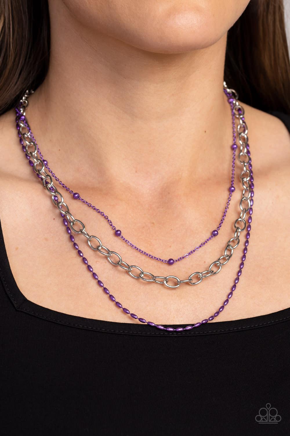 Mardi Gras Mayhem Purple Necklace - Paparazzi Accessories- on model - CarasShop.com - Paparazzi Jewelry by Cara Jewels