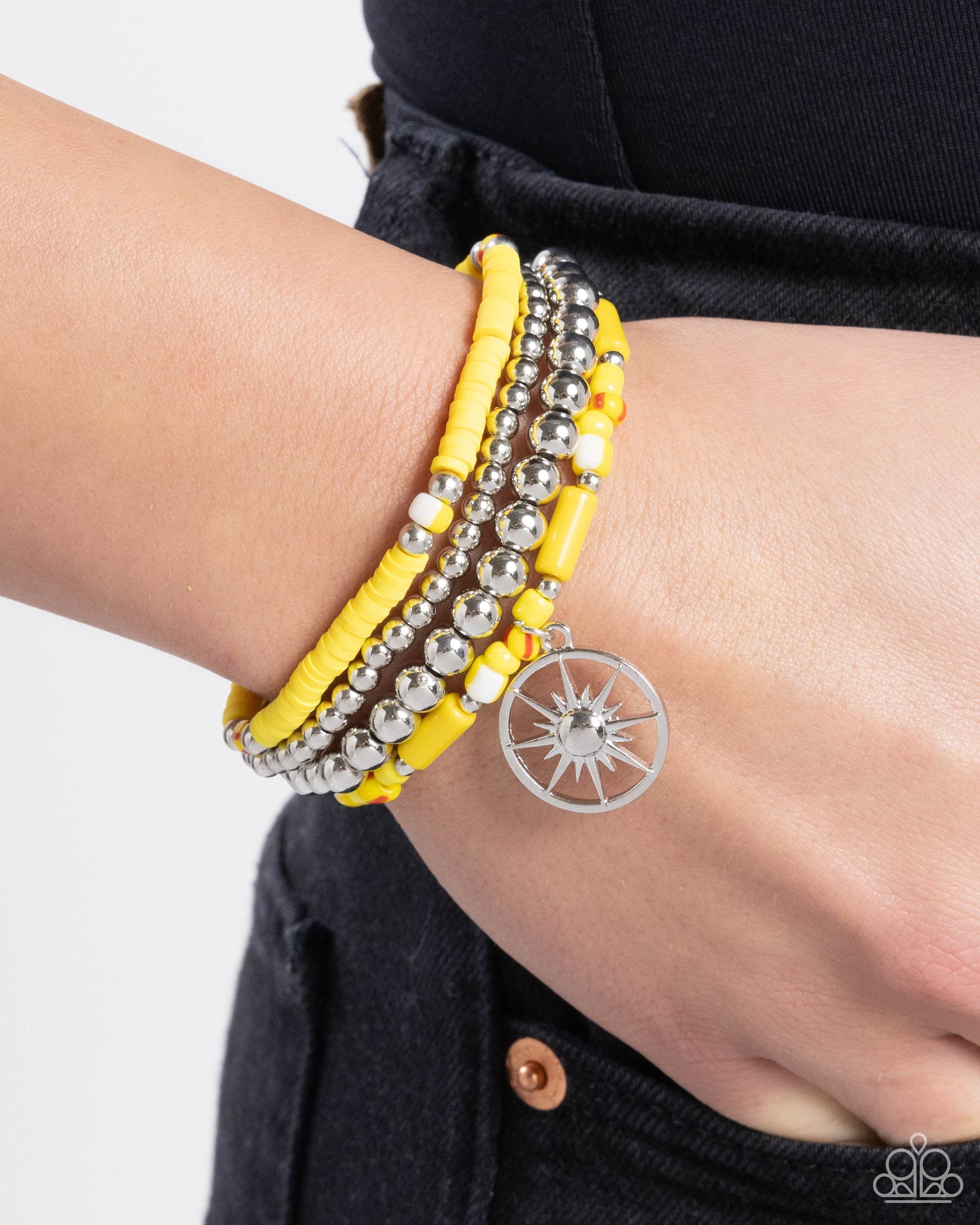 Nuanced Navigator Yellow & Silver Sunburst Charm Bracelet Set - Paparazzi Accessories- lightbox - CarasShop.com - Paparazzi Jewelry by Cara Jewels