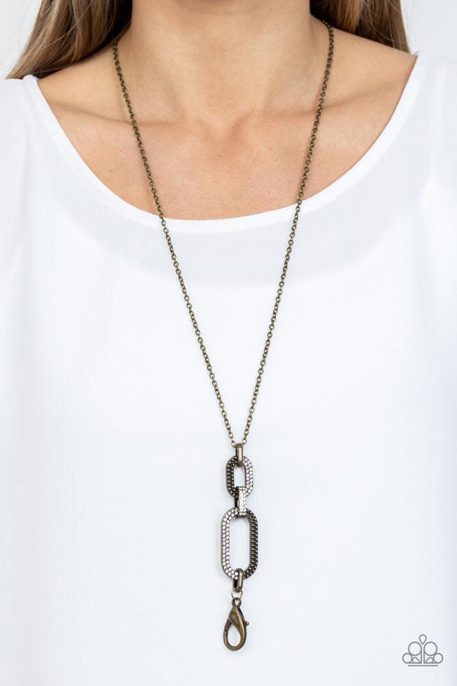 OVAL-statement of the Year Brass Necklace - Paparazzi Accessories- on model - CarasShop.com - Paparazzi Jewelry by Cara Jewels