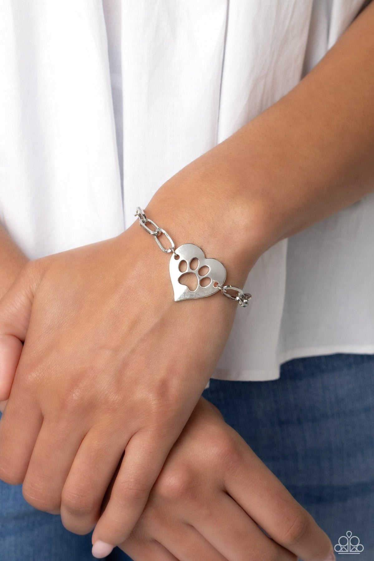 PAW-sitively Perfect Silver Bracelet - Paparazzi Accessories- on model - CarasShop.com - Paparazzi Jewelry by Cara Jewels