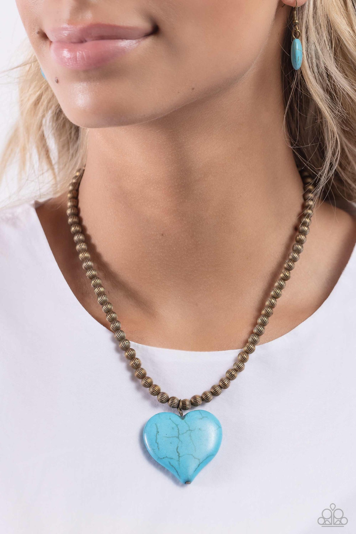 Picturesque Pairing Brass & Turquoise Stone Heart Necklace - Paparazzi Accessories- on model - CarasShop.com - Paparazzi Jewelry by Cara Jewels