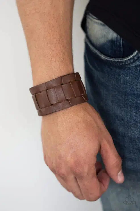 Plainly Plaited Brown Leather Urban Bracelet - Paparazzi Accessories- on model - CarasShop.com - Paparazzi Jewelry by Cara Jewels