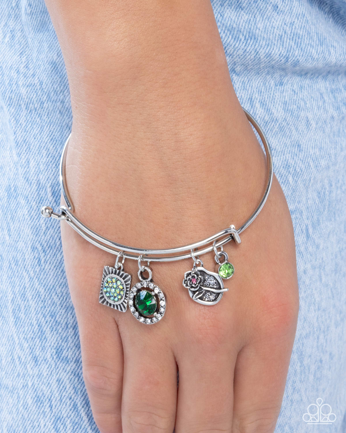 Playful Pageantry Green Rhinestone Charm Bangle Bracelet - Paparazzi Accessories- on model - CarasShop.com - Paparazzi Jewelry by Cara Jewels