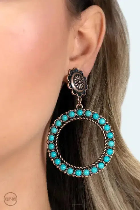 Playfully Prairie Copper Clip-on Earrings - Paparazzi Accessories- on model - CarasShop.com - Paparazzi Jewelry by Cara Jewels