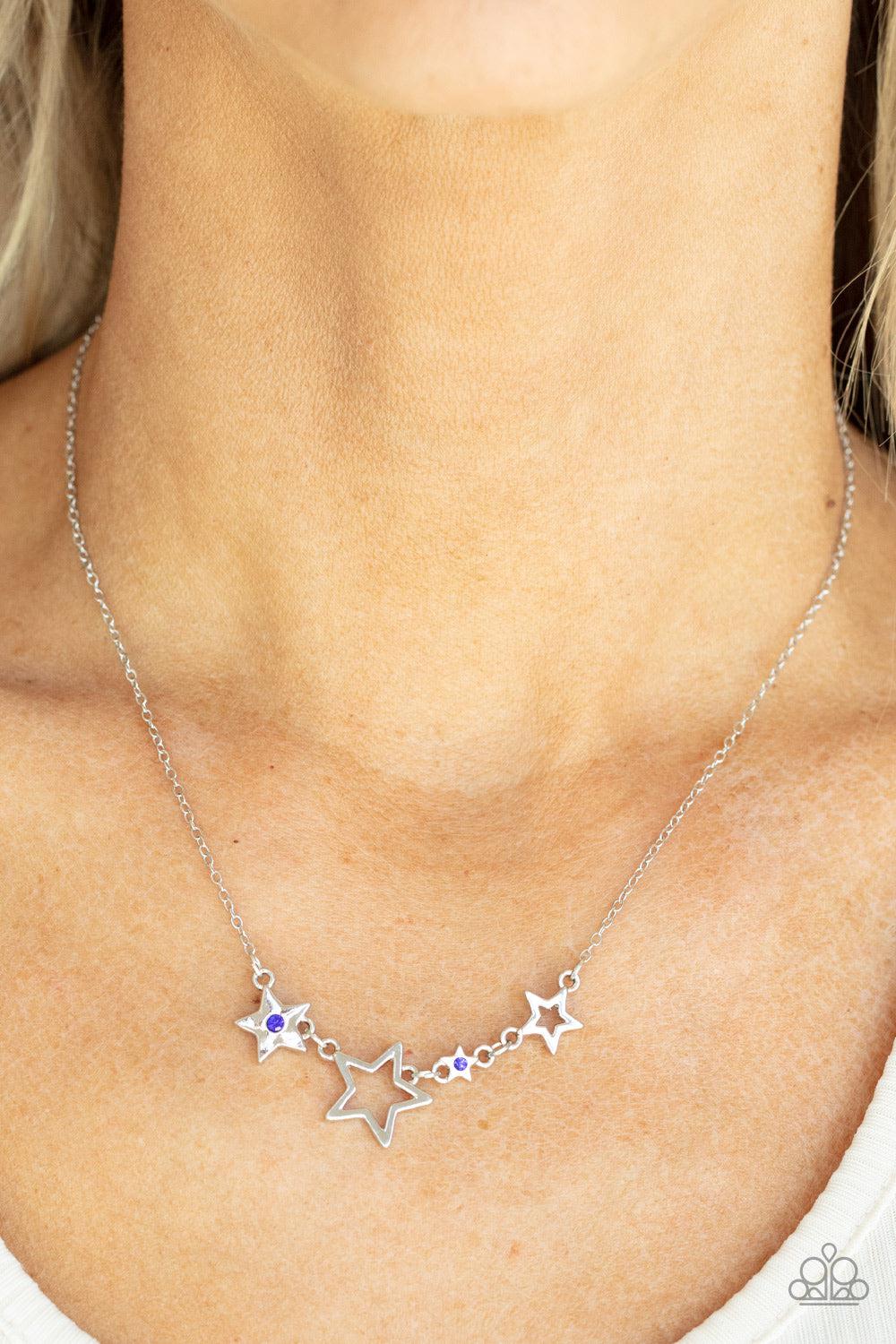 Proudly Patriotic Blue Rhinestone Star Necklace - Paparazzi Accessories- on model - CarasShop.com - Paparazzi Jewelry by Cara Jewels