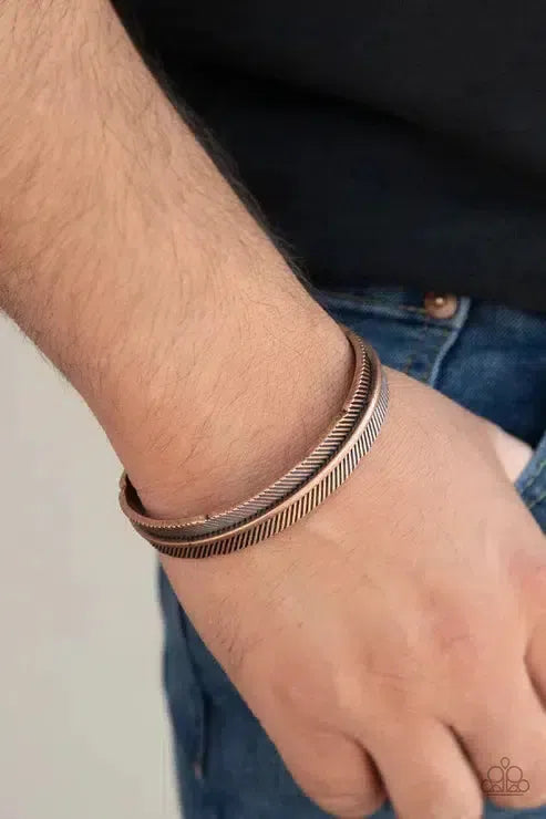 QUILL-Call Men's Copper Cuff Bracelet - Paparazzi Accessories-on model - CarasShop.com - Paparazzi Jewelry by Cara Jewels
